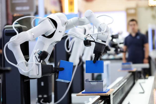 SHANGHAI, CHINA - JULY 17: A humanoid robot works on a battery module production line during the 2026 World AI Conference and High-Level Meeting on Global AI Governance on July 17, 2026 in Shanghai, China. Themed AI Partnership for a Brighter Future, the event will include more than 140 forums, bringing together 1,400 guests from home and abroad.  Copyright: xChinaxNewsxServicex 111654825195
