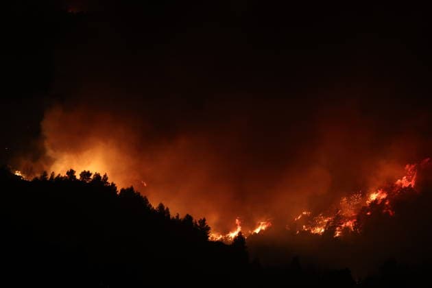 Wildfire in Algeria BLIDA, ALGERIA - JULY 17: Smoke and flame rise from a wildfire as extinguishing work is continue in Blida, Algeria on July 17, 2026.Firefighters brought 65 of the blazes under control, while 46 remained active across 18 provinces. Major firefighting operations were underway in Bejaia, Annaba, Skikda, Blida, Tizi Ouzou, Boumerdes, Ain Defla and Tlemcen, supported by firefighting aircraft and helicopters. Hamza Zait Anadolu Blida Algeria. Editorial use only. Please get in touch for any other usage.  Copyright: x2026xAnadoluxHamzaxZaitx