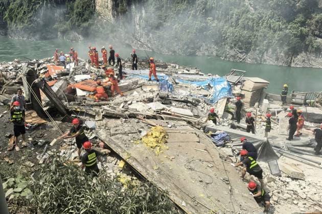 RECORD DATE NOT STATED 270759.jpg Rescue in the aftermath of a massive landslide caused multiple buildings to collapse near the Wujiang Three Bridges in Pengshui, Chongqing, China, on Friday July 17, 2026. State media says a landslide in the southwestern Chinese city of Chongqing has buried some residential buildings, trapping an undetermined number of people. A landslide Friday in the southwestern Chinese city of Chongqing buried some residential buildings, trapping an undetermined number of people, state media reported. State broadcaster CCTV said at least eight people were rescued from the debris, and that search and rescue operations were ongoing. CCTV said the landslide occurred at around 9:08 a.m. in Chongqing EDITORIAL USE ONLY  Copyright: xx 270759 x eyepress127279