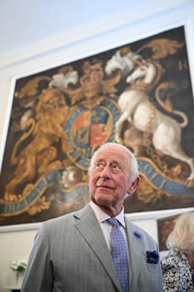 Charles and Camilla visit Blandford Forum Britain s King Charles III arrives to view the newly restored George II Royal Coat of Arms (behind) during a visit to the recently renovated historic Town Hall and Corn Exchange, built in 1734, in Blandford Forum, Dorset, south-west England on July 16, 2026., Credit:JUSTIN TALLIS PA ROTA - B68 Avalon United Kingdom, Dorset, Blandford Forum  Copyright: xJUSTINxTALLISx xPAxROTAx-xB68x xAvalonx 1117025654