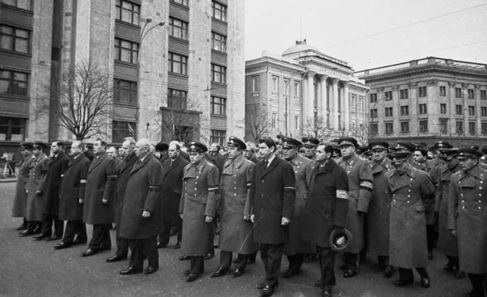 Moscow, USSR. Heroes of the Soviet Union, Soviet cosmonauts Gherman Titov and Valery Bykovsky, First Deputy Chairman of the USSR Council of Ministers Dmitry Polyansky, Secretary of the CPSU Central Committee Andrei Kirilenko, General Secretary of the CPSU Central Committee Leonid Brezhnev, Chairman of the USSR Council of Ministers Alexei Kosygin, Chairman of the Presidium of the Supreme Soviet of the USSR Nikolai Podgorny, Hero of the Soviet Union, Soviet cosmonaut Andriyan Nikolayev (L-R in 1st row) and Hero of the Soviet Union, Soviet cosmonaut Boris Yegorov (2nd R in 1st row) walk along Marx Prospekt (Avenue) during the funeral of Heroes of the Soviet Union, the world s first cosmonaut, Soviet cosmonaut Yuri Gagarin and Soviet test pilot  95138088