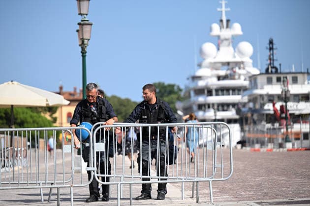 Protest against the visit of US Ambassador to Italy Tilman Fertitta in Venice, Italy VENICE, ITALY - JULY 17: Police officers prepare as US Ambassador to Italy Tilman Fertitta’s 117-metre megayacht is moored in Venice, Italy, on July 17, 2026 ahead of a protest opposing Fertitta s visit during the city s annual Redentore festival and criticized mass tourism, the influence of billionaires on Venice, and US policies under President Donald Trump. Piero Cruciatti Anadolu Veneto Italy. Editorial use only. Please get in touch for any other usage.  Copyright: x2026xAnadoluxPieroxCruciattix