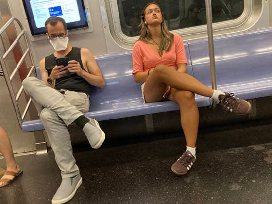 Subway ridership in New York Subway riders, one with a mask in New York on Thursday, July 16, 2026. New York has an air quality alert because of smoke drifting down from Canadian wildfires. (  RichardxB.xLevine