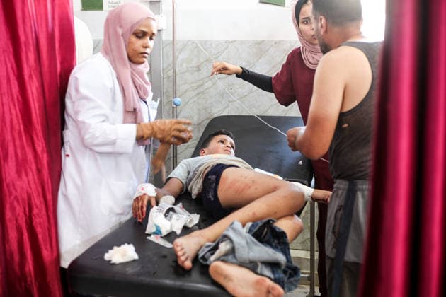 Wounded Palestinians receive treatment at Al-Awda Hospital in Nuseirat Wounded Palestinians, including children, receive treatment at Al-Awda Hospital in the Nuseirat refugee camp, central Gaza Strip, on July 17, 2026. According to the information provided, an Israeli army strike targeted a gathering of Palestinians in the Nuseirat refugee camp, killing seven people and injuring many others. Photo by Moiz Salhi apaimages Nusairat Gaza Strip Palestinian Territory 170726_Nusairat_MS_00(13) Copyright: xapaimagesxMoizxSalhixx xapaimagesx