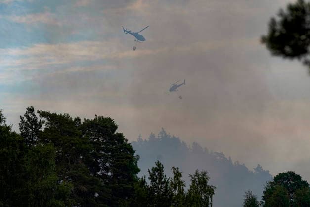 Brann i Drammen Drammen 20260717. Storbrann som har spredt seg fra rekkehus ved Krokstadelva i Drammen. Foto: Thomas Fure NTB Drammen Norge 5sVqYzFK2ww EDITORIAL USE ONLY Ref:_BNC5sVqYzFK2ww.jpg *** Fire in Drammen Drammen 20260717 Major fire that has spread from townhouses near Krokstadelva in Drammen Photo: Thomas Fure, NTB Drammen, Norway 5sVqYzFK2ww EDITORIAL USE ONLY Ref BNC5sVqYzFK2ww jpg  Copyright: xThomasxFurex xNTBx