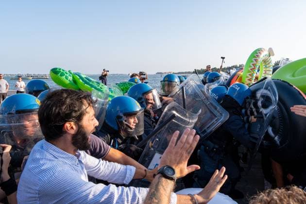 July 17, 2026, Venice, Italy: VENICE, ITALY Ã¢â‚¬ JULY 17, 2026: Hundreds of demonstrators march through Venice to protest against U.S. Ambassador to Italy Tilman J. Fertitta, who arrived earlier in the day aboard a 117-metre yacht as part of a coastal diplomacy tour. Protesters attempted to approach the yacht but were pushed back by police ahead of the annual Festa del Redentore, one of VeniceÃ¢â‚¬â ¢s largest traditional celebrations. Leonardo Garvaglia JNA PRESS Venice Italy - ZUMAq101 20260717_zna_q101_114 Copyright: xLeonardoxGaravagliax