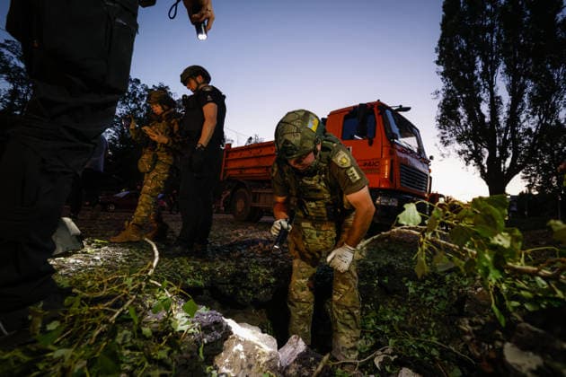 The aftermath of a Russian Banderol missile hitting the road in Kharkiv KHARKIV, UKRAINE - JULY 17: Ukrainian law enforcement officers inspect the crater and debris of a missile in Kharkiv, Ukraine on July 17, 2026. A Russian Banderol missile hit a road in Kharkiv. The missile strike injured nine people and killed one. Sofiia Bobok Anadolu Kharkiv Ukraine. Editorial use only. Please get in touch for any other usage.  Copyright: x2026xAnadoluxSofiiaxBobokx