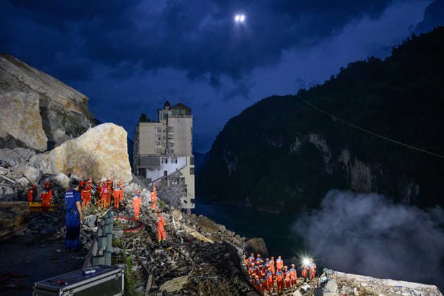 CHONGQING, CHINA - JULY 17: Rescue workers conduct night search operations at the site of a landslide on July 17, 2026 in Chongqing, China. A landslide occurred around 9 a.m. in Hanjia Street along the Wujiang River in Pengwa Miao and Tujia Autonomous County, burying several residential buildings and trapping people. Emergency response and fire departments are working with local authorities on rescue and disposal efforts.  Copyright: xChinaxNewsxServicex 111654893448