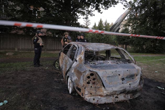 July 17, 2026, Kharkiv, Kharkiv Oblast, Ukraine: A severely damaged sedan sits cordoned off by police tape following a russian Banderol missile strike in Shevchenkivskyi District, Kharkiv, Ukraine on July 17, 2026. The attack killed one 40-year-old man inside the vehicle and wounded seven others; an educational facility and commercial buildings were also damaged in the strike. Kharkiv Ukraine  - ZUMAt164 20260717_zip_t164_015 Copyright: xYevhenxTitovx