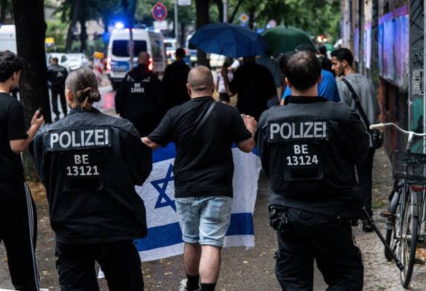 Protest Held Against AI Surveillance Measures in Berlin BERLIN, GERMANY JULY 17, 2026: Demonstrators take part in a protest against the deployment of an AI-assisted police surveillance system in Berlin on July 17, 2026. The system, introduced in selected areas of the city, is designed to analyze video footage and detect what authorities describe as suspicious behavior. Critics argue the technology expands state surveillance, raises privacy concerns and risks discriminatory policing and the criminalization of marginalized communities. Berlin Germany Copyright: x xAndrÃ sxTrujillox xJNAxPressx