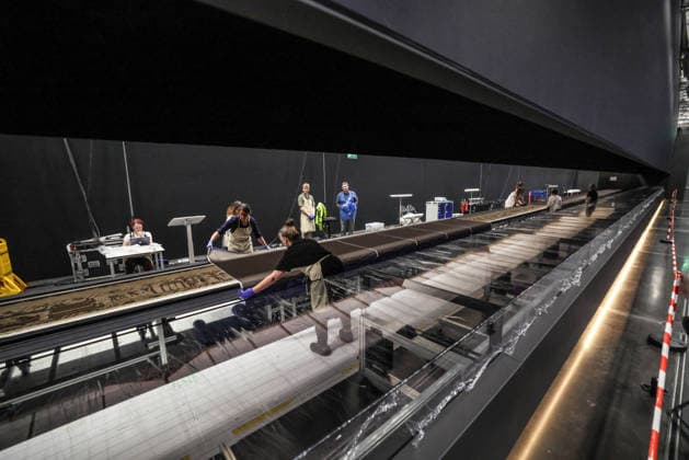 The Bayeux tapestry 17.07.2026. The Bayeux tapestry is laid flat and gently uncovered by French and British conservators behind the 70 meter long glass case that it will be displayed in at The British Museum.  Copyright: xRichardxPohlex NINTCHDBPICT001095917279