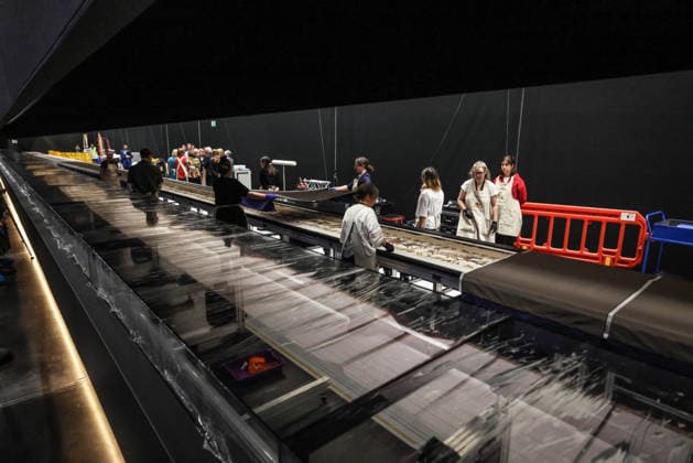 The Bayeux tapestry 17.07.2026. The Bayeux tapestry is laid flat and gently uncovered by French and British conservators behind the 70 meter long glass case that it will be displayed in at The British Museum.  Copyright: xRichardxPohlex NINTCHDBPICT001095917321