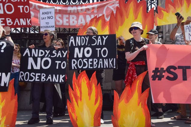 July 18, 2026, London, England, United Kingdom: Activists from Fossil Free London stage a protest outside the parliament calling on incoming Prime Minister Andy Burnham to stop the Rosebank oil and gas field in the North Sea. London United Kingdom - ZUMAv130 20260718_zip_v130_003 Copyright: xVukxValcicx
