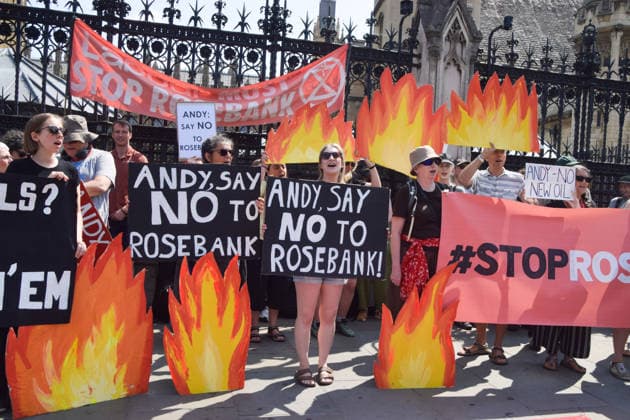 July 18, 2026, London, England, United Kingdom: Activists from Fossil Free London stage a protest outside the parliament calling on incoming Prime Minister Andy Burnham to stop the Rosebank oil and gas field in the North Sea. London United Kingdom - ZUMAv130 20260718_zip_v130_004 Copyright: xVukxValcicx