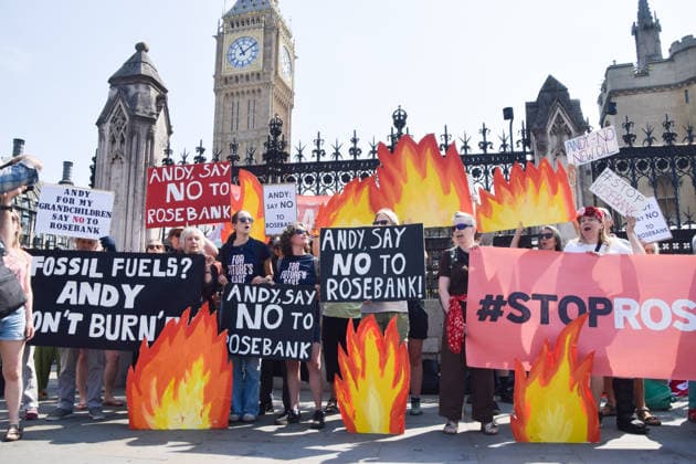 July 18, 2026, London, England, United Kingdom: Activists from Fossil Free London stage a protest outside the parliament calling on incoming Prime Minister Andy Burnham to stop the Rosebank oil and gas field in the North Sea. London United Kingdom - ZUMAv130 20260718_zip_v130_010 Copyright: xVukxValcicx