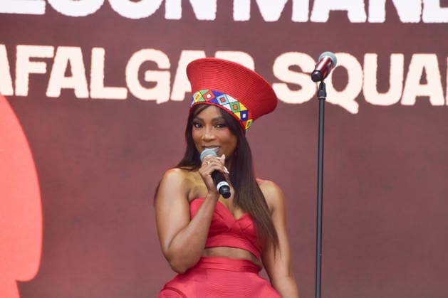 July 18, 2026, London, England, United Kingdom: A presenter introduces the musicians performing at the Nelson Mandela Day celebration in Trafalgar Square, honouring the life and legacy of Nelson Mandela. This year also marks the 30th anniversary of the South African Constitution. London United Kingdom - ZUMAv130 20260718_zip_v130_043 Copyright: xVukxValcicx