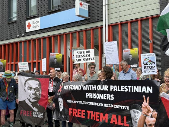 Demonstration in support of Palestine in Amsterdam AMSTERDAM, NETHERLANDS - JULY 18: People gather in front of the Dutch Red Cross (Rode Kruis) to show solidarity with Palestine demanding the release of Dr. Husam Abu Safiya, chief physician of Kamal Adwan Hospital, whose health condition is reportedly worsening while being held in an Israeli prison, and calling on the International Red Cross to visit him, in Amsterdam, the Netherlands on July 18, 2026. Selman Aksunger Anadolu Amsterdam Netherlands. Editorial use only. Please get in touch for any other usage.  Copyright: x2026xAnadoluxSelmanxAksungerx