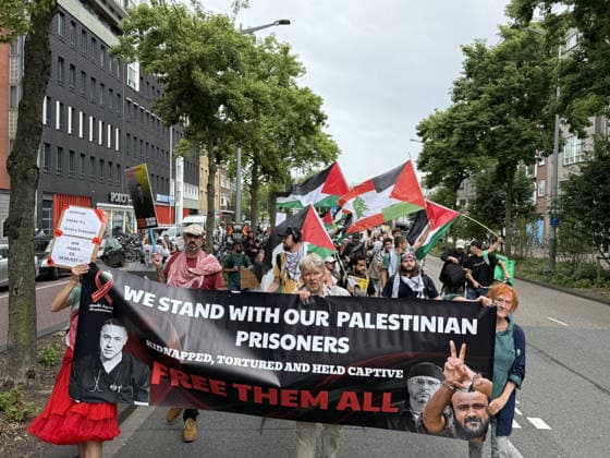 Demonstration in support of Palestine in Amsterdam AMSTERDAM, NETHERLANDS - JULY 18: People gather in front of the Dutch Red Cross (Rode Kruis) to show solidarity with Palestine demanding the release of Dr. Husam Abu Safiya, chief physician of Kamal Adwan Hospital, whose health condition is reportedly worsening while being held in an Israeli prison, and calling on the International Red Cross to visit him, in Amsterdam, the Netherlands on July 18, 2026. Selman Aksunger Anadolu Amsterdam Netherlands. Editorial use only. Please get in touch for any other usage.  Copyright: x2026xAnadoluxSelmanxAksungerx