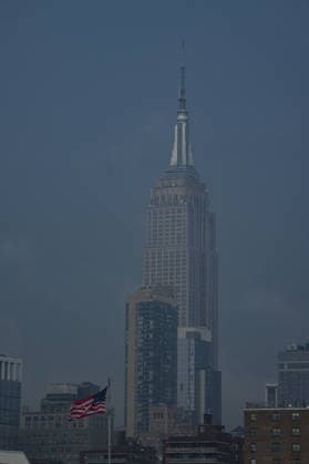 July 18, 2026, New York, New York, USA: Smoke from Canadian Wildfires hangs over the Empire State Building in Manhattan on July 18, 2026 in New York. More than 200 wildfires are burning in Canada causing smoke to drift across the United States spiking the air quality index. New York USA - ZUMAb148 20260718_zap_b148_033 Copyright: xBryanxSmithx