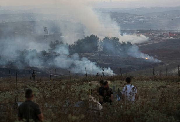 News Themen der Woche KW29 Israeli settlers set fire to Palestinian agricultural lands in Nablus village??????? NABLUS, WEST BANK, PALESTINE - JULY 18: Smoke rise as a large-scale fire burns through Palestinian agricultural lands in the village of Tel, south of Nablus in the West Bank, Palestine on July 18, 2026. A group of Israeli settlers deliberately set fire to the crop fields, forcing local Palestinian landowners to battle the fast-spreading flames with basic tools before emergency fire crews arrived to conduct ground and aerial firefighting operations to contain the blaze. Nedal Eshtayah Anadolu Nablus West Bank. Editorial use only. Please get in touch for any other usage.  Copyright: x2026xAnadoluxNedalxEshtayahx