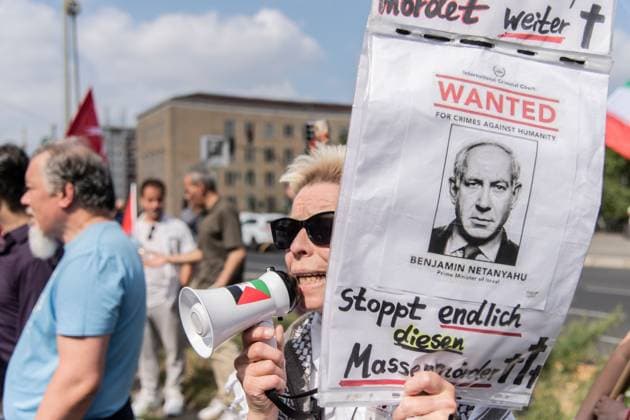 Pro-Palestinian Demonstration Held in Berlin BERLIN, GERMANY JULY 18, 2026: Hundreds of people march through the streets of Berlin during a pro-Palestinian demonstration calling for an end to the war in Gaza and expressing solidarity with Lebanon and Iran on July 18, 2026. A small group of counter-demonstrators was present along parts of the march under police supervision as officers monitored the demonstration. Berlin Germany Copyright: x xAndrÃ sxTrujillox xJNAxPressx