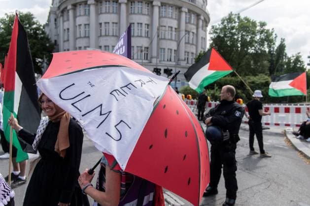 July 18, 2026, Berlin, Germany: BERLIN, GERMANY Ã¢â‚¬ JULY 18, 2026: Hundreds of people march through the streets of Berlin during a pro-Palestinian demonstration calling for an end to the war in Gaza and expressing solidarity with Lebanon and Iran on July 18, 2026. A small group of counter-demonstrators was present along parts of the march under police supervision as officers monitored the demonstration. Andro s Trujillo JNA PRESS Berlin Germany - ZUMAq101 20260718_zna_q101_203 Copyright: xAndro SxTrujillox
