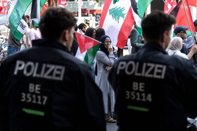 July 18, 2026, Berlin, Germany: BERLIN, GERMANY Ã¢â‚¬ JULY 18, 2026: Hundreds of people march through the streets of Berlin during a pro-Palestinian demonstration calling for an end to the war in Gaza and expressing solidarity with Lebanon and Iran on July 18, 2026. A small group of counter-demonstrators was present along parts of the march under police supervision as officers monitored the demonstration. Andro s Trujillo JNA PRESS Berlin Germany - ZUMAq101 20260718_zna_q101_204 Copyright: xAndro SxTrujillox