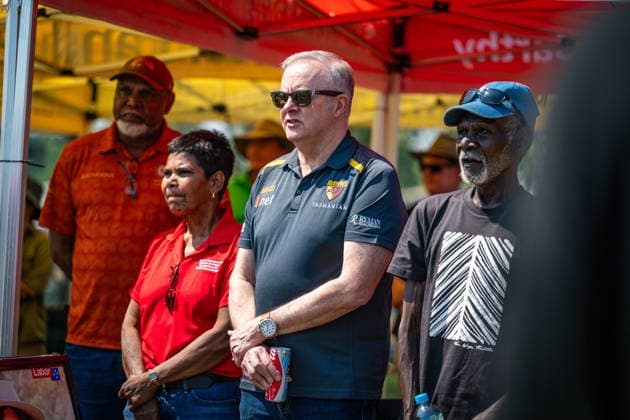 ANTHONY ALBANESE TIWI ISLANDS VISIT, Australian Prime Minister Anthony Albanese during national anthem at Stanley Tipiloura Oval on Bathurst Island, Northern Territory, Sunday, July 19, 2026. ( NO ARCHIVING BATHURST ISLAND NORTHERN TERRITORY AUSTRALIA  Copyright: xPATCHxCLAPPx 20260719125789040181