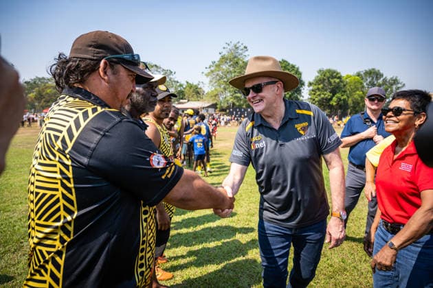 ANTHONY ALBANESE TIWI ISLANDS VISIT, Australian Prime Minister Anthony Albanese greets players and coaches at Stanley Tipiloura Oval on Bathurst Island, Northern Territory, Sunday, July 19, 2026. ( NO ARCHIVING BATHURST ISLAND NORTHERN TERRITORY AUSTRALIA  Copyright: xPATCHxCLAPPx 20260719118147696648