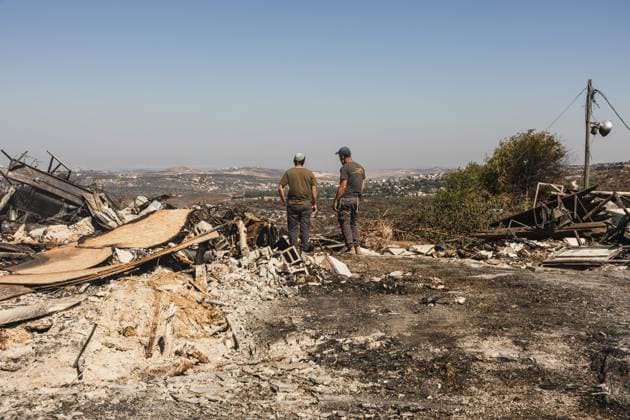Major wildfire destroys homes near Havat Gilad in the West Bank HAVAT GILAD, WEST BANK JULY 19, 2026: Firefighters battle a wildfire near Havat Gilad in the occupied West Bank after a blaze rapidly spread through dry vegetation, destroying about 30 structures, including homes and businesses. Israeli authorities said they were investigating the incident as a suspected nationalist-motivated arson attack after a person allegedly threw a burning object from a moving vehicle. Two emergency responders were injured. West Bank, Havat Gilad PS Copyright: x xHilelxbenxorx xJNAxPressx
