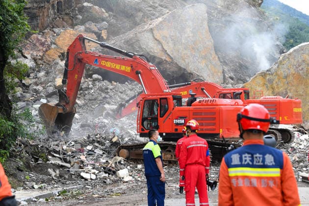 (260719) -- CHONGQING, July 19, 2026 -- Rescuers work at the site of a mountain collapse in Pengshui Miao and Tujia Autonomous County of Chongqing, southwest China, July 19, 2026. A rainfall-induced mountain collapse occurred at 9:08 a.m. on Friday in the Hanjia sub-district of Pengshui, burying more than 10 residential buildings, while leaving some local residents trapped and unaccounted for. China activated a Level-II national emergency response for geological disasters. Multiple rescue forces including emergency response, fire control and public security rushed to the scene and launched full-scale search and rescue operations, while local residents also volunteered to take part in the rescue efforts. ) CHINA-CHONGQING-PENGSHUI-MOUNTA 