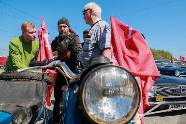 RUSSIA, VOLOGDA REGION - JULY 19, 2026: Alexander Khirurg Zaldostanov (C), President of the Night Wolves Motorcycle Club, attends a ceremony to unveil a monument to Soviet leader Joseph Stalin (1878-1953) and metallurgist Ivan Bardin (1883-1960) amid improvements to a garden square at the intersection of Victory Avenue, Metallurgov and Stalevarov Streets in Cherepovets, west of Vologda Russia  - ZUMAt113 20260719_zaa_t113_121 Copyright: xVladimirxSmirnovx