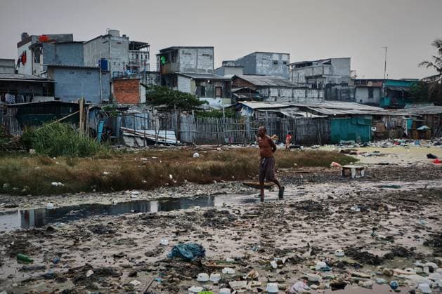 July 19, 2026, Jakarta, Indonesia: JAKARTA, INDONESIA Ã¢â‚¬ JULY 19, 2026: Children sit and play outside a house in Kampung Muara Baru, North Jakarta. According to the Jakarta Public Housing and Settlement Agency (DPRKP), high population density, limited land for infrastructure development, zoning constraints and land tenure issues remain among the main challenges to improving informal settlements in the Indonesian capital. JNA Press Jakarta Indonesia - ZUMAq101 20260719_zna_q101_080 Copyright: xMuhammadxRizkyxFebriansyahx