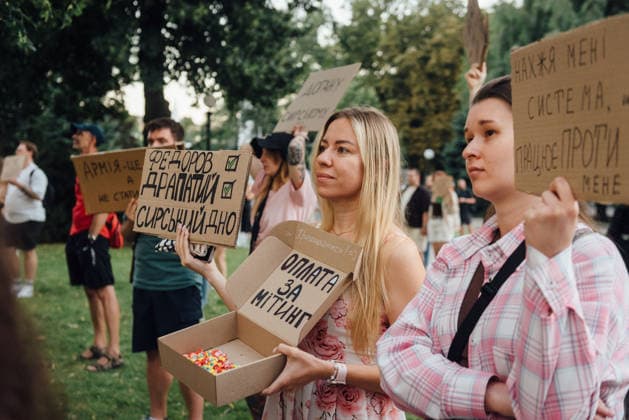 July 18, 2026, Dnipro, Dnipropetrovsk Oblast, Ukraine: Demonstrators holding banners rallied to protest the resignation of Ukrainian Defence Minister Mykhailo Fedorov. After President Zelenskyy announced a government reshuffle on July 12, Defence Minister Mykhailo Fedorov resigned on July 15. His departure triggered nationwide protests, with crowds urging the President to keep Fedorov in office. Dnipro Ukraine - ZUMAp259 20260718_zip_p259_017 Copyright: xDenxPolyakovx