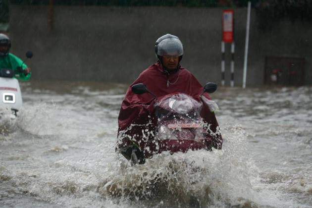 Monsoon Rains Inundate Roads In Central Kathmandu Commuters wade through a waterlogged road after heavy monsoon rainfall inundated the Maitighar Mandala area in Kathmandu, Nepal, on July 19, 2026. Continuous rain caused localized flooding and disrupted traffic and daily life in several parts of the capital, with pedestrians and motorists navigating through floodwaters as the monsoon season continues. Kathmandu Nepal  Copyright: xSanjitxPariyarx originalFilename: pariyar-notitle260719_npW1Z.jpg