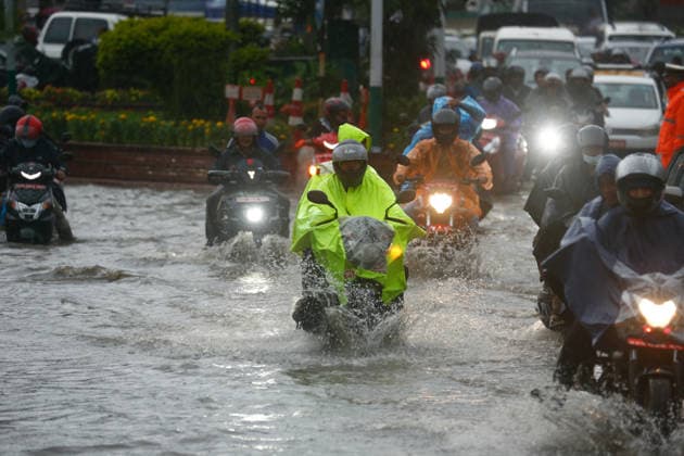 Monsoon Rains Inundate Roads In Central Kathmandu Commuters wade through a waterlogged road after heavy monsoon rainfall inundated the Maitighar Mandala area in Kathmandu, Nepal, on July 19, 2026. Continuous rain caused localized flooding and disrupted traffic and daily life in several parts of the capital, with pedestrians and motorists navigating through floodwaters as the monsoon season continues. Kathmandu Nepal  Copyright: xSanjitxPariyarx originalFilename: pariyar-notitle260719_npzjE.jpg