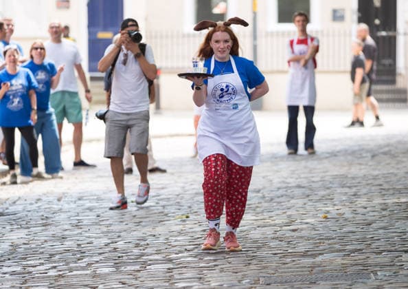 July 19, 2026, Bristol, Bristol, UK: Bristol, UK. The inaugural Bristol Waiters Race sees teams race while balancing trays through Queen Square in support of The Grand Appeal, at Bristol Harbour Festival in warm weather at the end of the latest summer heatwave in the UK. The event includes maritime displays and boats and ships with music, circus and other performances. Bristol UK  - ZUMAl94_ 20260719_zaf_l94_007 Copyright: xSimonxChapmanx