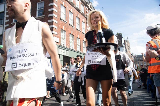 SOHO Waiters Race at SOHO, London, UK - Sun 19 July 2026 Waiters from various London restaurants take part in the annual SOHO Waiters Race, balancing a champagne bottle and a glass around SOHO in London, England, UK on Sunday 19 July 2026 as part of the SOHO Village Fete., Credit:Justin Ng Avalon UK, England, London, SOHO  Copyright: xJustinxNgx xAvalonx 1117372163