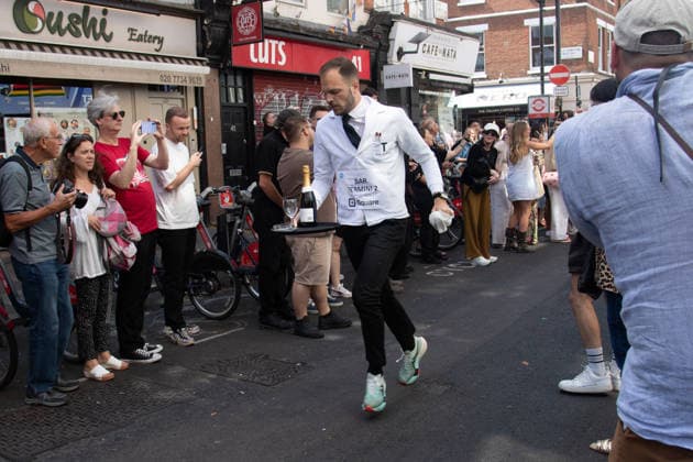 SOHO Waiters Race at SOHO, London, UK - Sun 19 July 2026 Waiters from various London restaurants take part in the annual SOHO Waiters Race, balancing a champagne bottle and a glass around SOHO in London, England, UK on Sunday 19 July 2026 as part of the SOHO Village Fete., Credit:Justin Ng Avalon UK, England, London, SOHO  Copyright: xJustinxNgx xAvalonx 1117372172