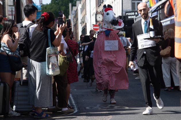 SOHO Waiters Race at SOHO, London, UK - Sun 19 July 2026 Waiters from various London restaurants take part in the annual SOHO Waiters Race, balancing a champagne bottle and a glass around SOHO in London, England, UK on Sunday 19 July 2026 as part of the SOHO Village Fete., Credit:Justin Ng Avalon UK, England, London, SOHO  Copyright: xJustinxNgx xAvalonx 1117372177
