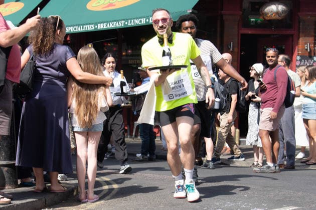 SOHO Waiters Race at SOHO, London, UK - Sun 19 July 2026 Waiters from various London restaurants take part in the annual SOHO Waiters Race, balancing a champagne bottle and a glass around SOHO in London, England, UK on Sunday 19 July 2026 as part of the SOHO Village Fete., Credit:Justin Ng Avalon UK, England, London, SOHO  Copyright: xJustinxNgx xAvalonx 1117372222