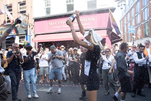 SOHO Waiters Race at SOHO, London, UK - Sun 19 July 2026 Waiters from various London restaurants take part in the annual SOHO Waiters Race, balancing a champagne bottle and a glass around SOHO in London, England, UK on Sunday 19 July 2026 as part of the SOHO Village Fete., Credit:Justin Ng Avalon UK, England, London, SOHO  Copyright: xJustinxNgx xAvalonx 1117372235