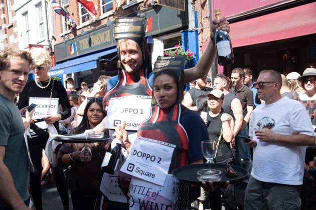SOHO Waiters Race at SOHO, London, UK - Sun 19 July 2026 Waiters from various London restaurants take part in the annual SOHO Waiters Race, balancing a champagne bottle and a glass around SOHO in London, England, UK on Sunday 19 July 2026 as part of the SOHO Village Fete., Credit:Justin Ng Avalon UK, England, London, SOHO  Copyright: xJustinxNgx xAvalonx 1117372248