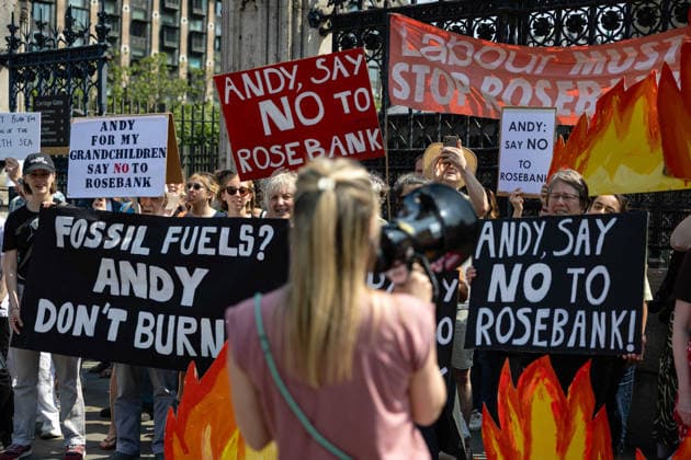 Fossil Free London Protest against Rosebank Oil Field outside Parliament, London, UK 18 July 2026 Campaigners from Fossil Free London demonstrate outside Parliament, London, UK, on 18 July 2026, with placards and banners calling on incoming Prime Minister Andy Burnham not to approve the Rosebank oil field or new North Sea drilling. The protest follows the UK s third heatwave in as many months, during which official statistics recorded over 2,700 heat-related deaths across England and Wales., Credit:Pete Speller Avalon  Copyright: xPetexSpellerx xAvalonx 1117383371