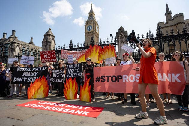 Fossil Free London Protest against Rosebank Oil Field outside Parliament, London, UK 18 July 2026 Campaigners from Fossil Free London demonstrate outside Parliament, London, UK, on 18 July 2026, with placards and banners calling on incoming Prime Minister Andy Burnham not to approve the Rosebank oil field or new North Sea drilling. The protest follows the UK s third heatwave in as many months, during which official statistics recorded over 2,700 heat-related deaths across England and Wales., Credit:Pete Speller Avalon  Copyright: xPetexSpellerx xAvalonx 1117383409