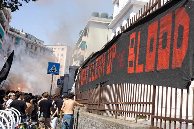 News - Genoa G8 25th anniversary protest Genoa, July 19, 2026, banner with the words DON T CLEAN UP THE BLOOD hung outside the Diaz school Genoa City centre Italy Copyright: xMattiaxDavidxRinaldix xLiveMediax LPN_2573723