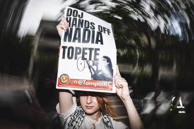 July 19, 2026, Tampa, Florida, USA: A sign in support of immigrant rights activist NADIA TOPETE while following the recent killings of two people, LORENZO SALGADO ARAUJO in Houston, Texas and JOHAN SEBASTIAN DURAN GUERRERO in Biddeford, Maine members of the Tampa Immigrant Rights Committee staged an emergency protest to show solidarity with all those affected. Tampa USA - ZUMAd256 20260719_znp_d256_003 Copyright: xDavexDeckerx