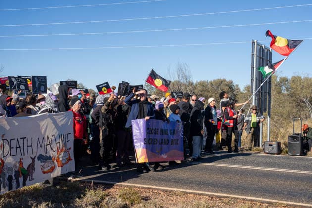 CLOSE PINE GAP PROTEST ALICE SPRINGS, Hundreds of protesters convoy during the three-day Close Pine Gap symposium in Alice Springs, Northern Territory, Monday, July 20, 2026. Those gathered are calling for the closure of the US military intelligence base Pine Gap, for an end to the US alliance, and for the sacred land the base occupies to be returned to Arrernte custodians, who never consented to the base. ( NO ARCHIVING ALICE SPRINGS NORTHERN TERRITORY AUSTRALIA  Copyright: xRHETTxHAMMERTONx 20260720162120052056