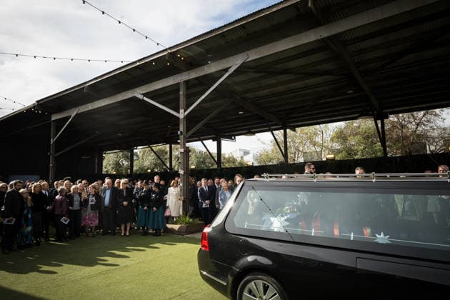 DERRYN HINCH STATE FUNERAL, Mourners pay tribute to Derryn Hinch during a State Funeral Service for Derryn Hinch at the Timber Yard, Melbourne, Monday, July 20, 2026. . Outspoken media figure and former senator Derryn Hinch has died at the age of 82 after a long and public health battle. ( NO ARCHIVING MELBOURNE VICTORIA AUSTRALIA  Copyright: xCHRISTOPHERxHOPKINSx 20260720165506878695