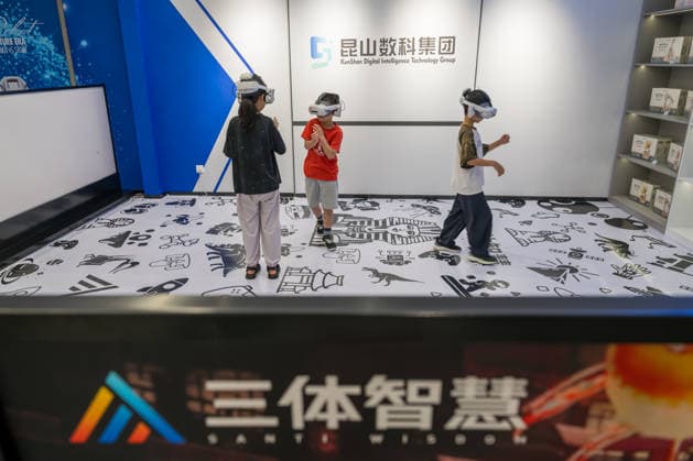 KUNSHAN, CHINA - JULY 19: People visit a robot 6S store on its opening day on July 19, 2026 in Kunshan, Jiangsu Province of China. The store offers integrated sales, spare parts, after-sales service, feedback, leasing, and customization services while serving as a hub for humanoid robots, drones, training, and industry incubation.  Copyright: xVCGx 111655192665